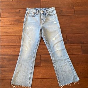 Levi’s high rise ankle crop kick flare jeans.